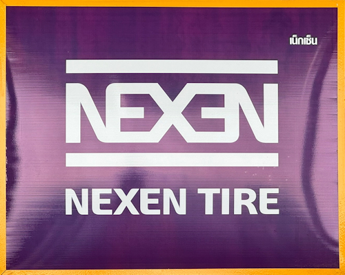 Nexten Tires sign
